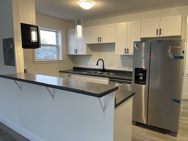 Photo - 289 Indian Rd S Unit 10