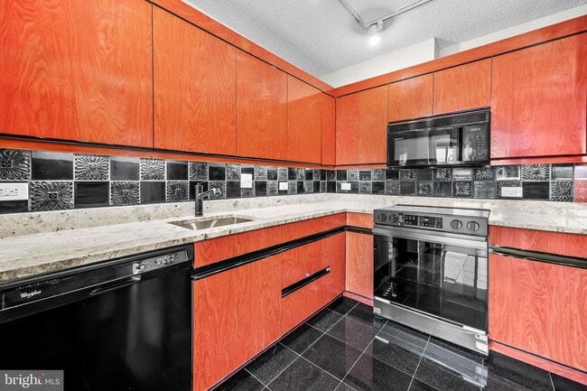 Building Photo - 4100 N Charles St Unit 605