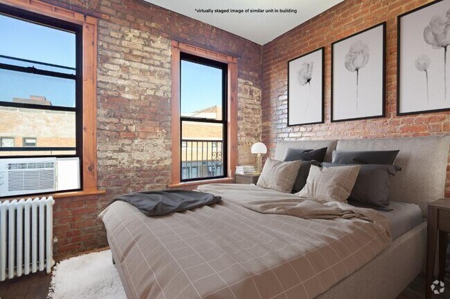 Building Photo - 410 E 13th St Unit 5F Rental