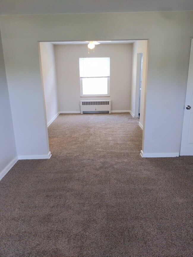 Living room looking into dining room - 1224 North Plum Street Unit Apt. 2