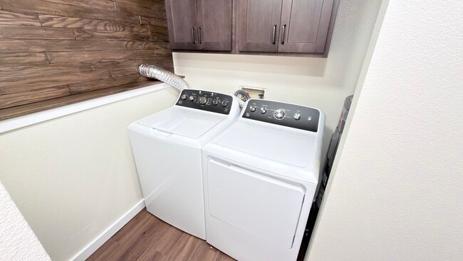 Full Size Washer / Dryer. Laundry Storage Above
