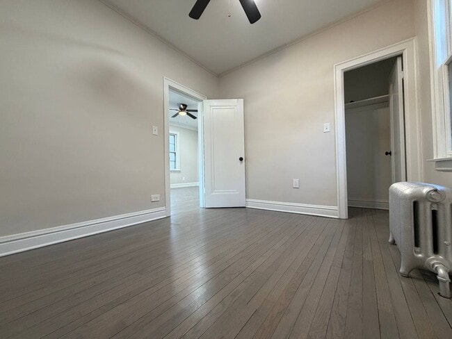 Photo - Spacious 5BR/2BA Home with Basement & Off-Street Parking