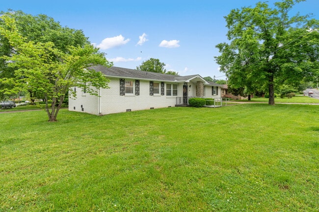 Front view of large yard (landscaping included in rent :)
