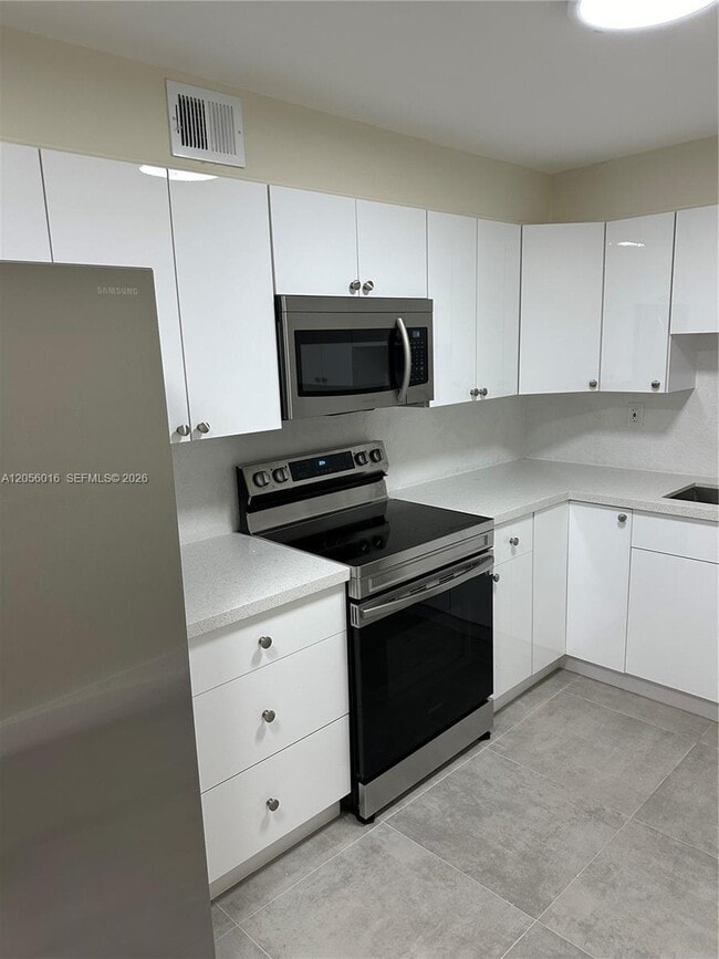 Building Photo - 10090 NW 80th Ct Unit 1421