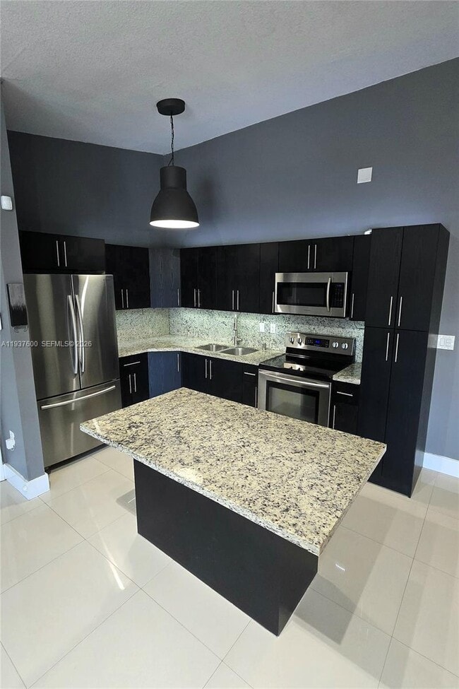 Building Photo - 18785 NW 62nd Ave Unit 208