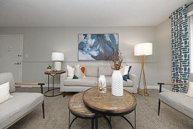Spacious living room with carpet