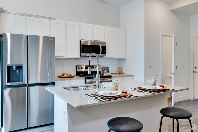 2BR, 2.5 BA - 1,288 sq feet - Kitchen & Dining