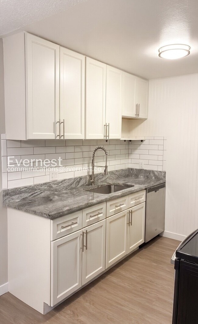 Photo - 2 Bed/1 Bath Condo with Off-Street Parking / Available Now! Unit A129