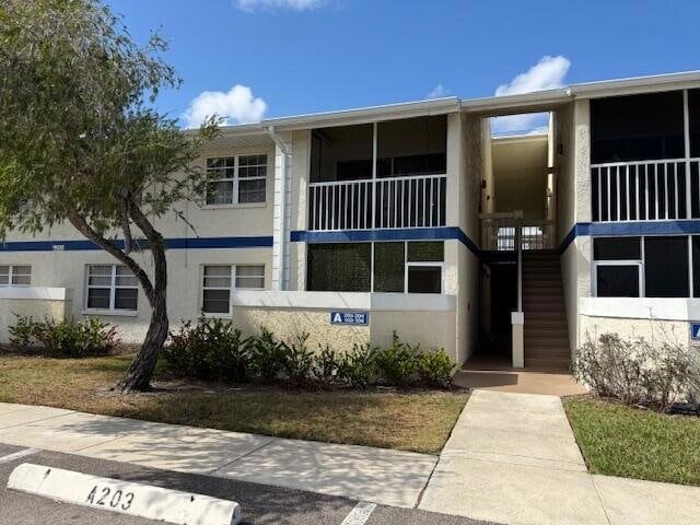 Building Photo - 1500 SE Royal Green Cir Unit 203