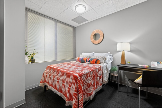 Cozy Carpeted A4 Bedroom at University Plaza NIU Off-Campus Apartments