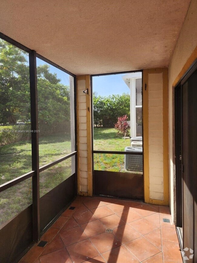 Building Photo - 19055 NW 62nd Ave Unit 107 Rental