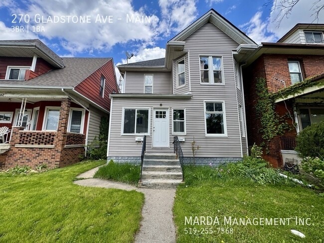 Building Photo - SPACIOUS 3 BED /1 BATH MAIN FLOOR Unit Main