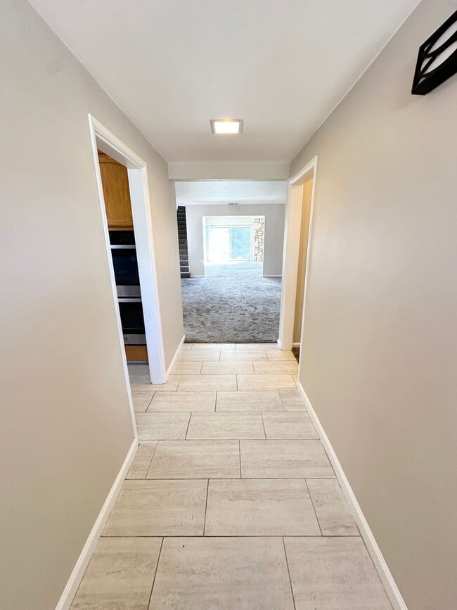 Photo - Spacious 4BD/2BA Two-Story Home with Yard, Fireplace & Parking in The Plaza