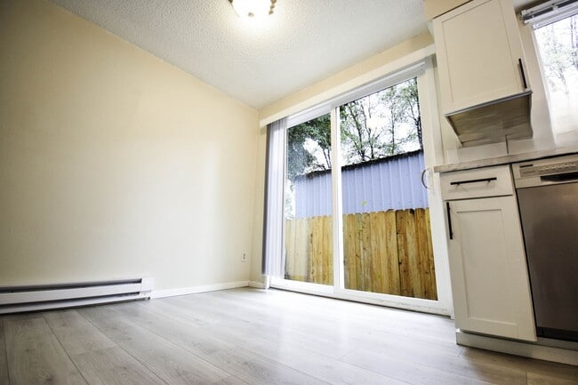 Photo - Newly Updated 2 BR Townhouse Apartment in ...