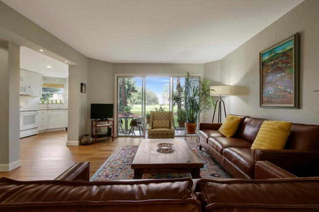 Building Photo - 3755 Via Poinciana Unit 111