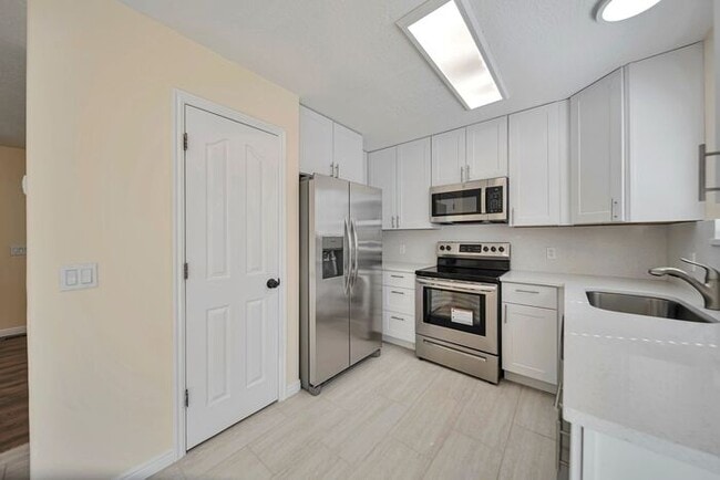 Photo - Awesome remodel home in great location w attached 2 car,!
