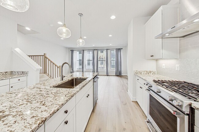 Photo - Contemporary 4 bedroom, 3.5 bath Open Concept Townhome!