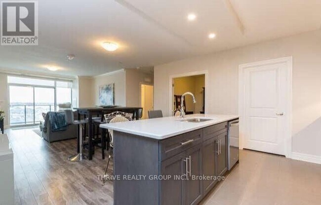 Photo - 260 Villagewalk Blvd Unité 707