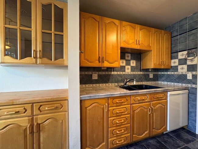 Photo - Watergate Garden Condo | 2 Bed, 2 Bath with Custom Tile Detail + Private Patio Unit B262