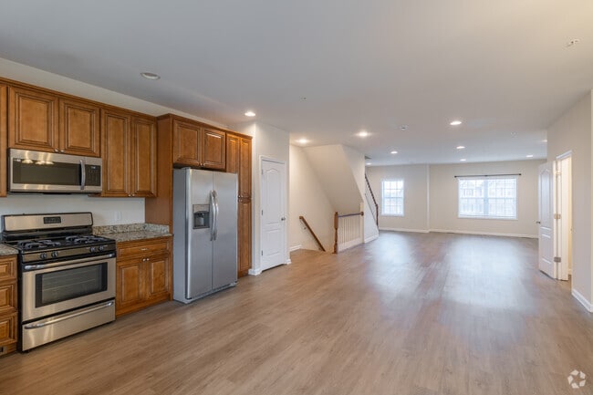 4BR, 2.5BA - 2,600SF - Kitchen and Living Room - Monticello Heights Townhomes