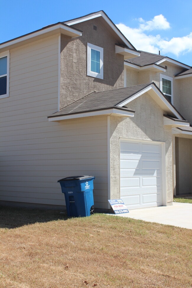 Full side yard view - 16922 Showdown Path