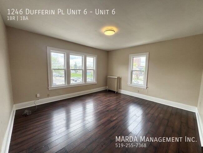 Building Photo - CHAMRING 1 BED/1 BATH APT ON DUFFERIN & GILES + HYDRO! Unit 6