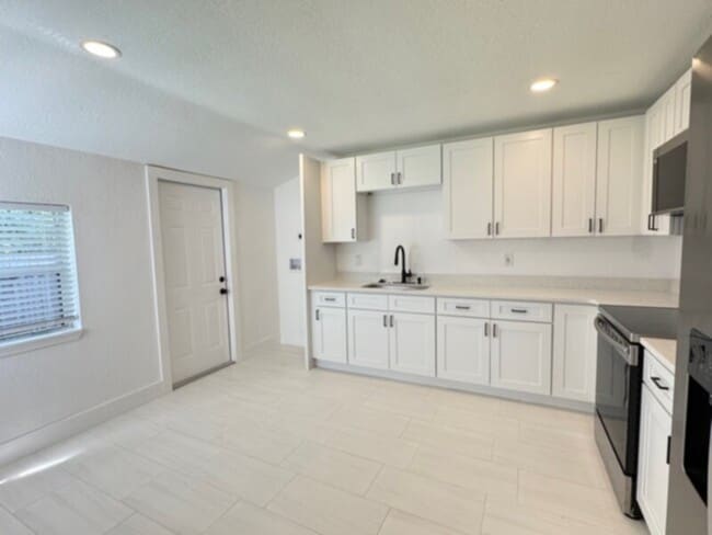 Photo - Completely Renovated 3 Bedroom Triplex wit...