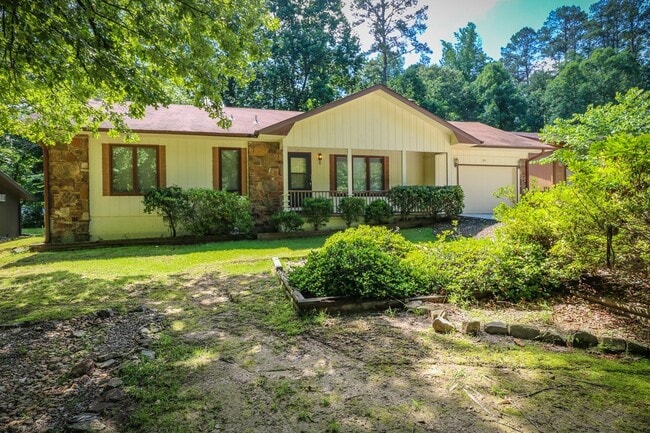 Photo - Two Bedroom, 2 Bath, 1-Car Garage, 1179 sq ft feet home with wood burning fireplace. and screened...