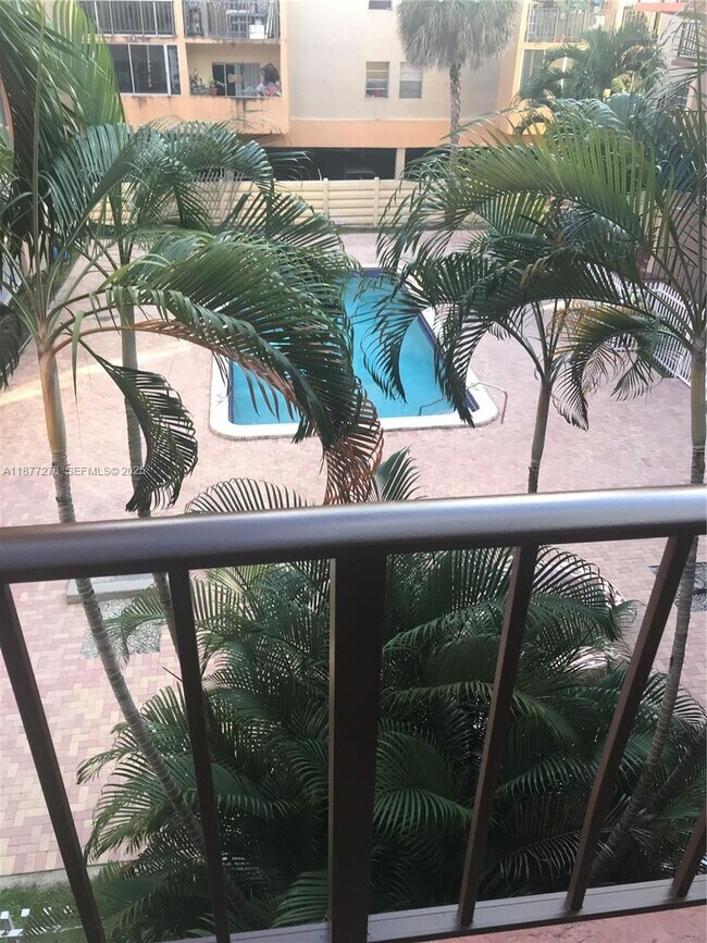 Building Photo - 6095 W 19th Ave Unit 304