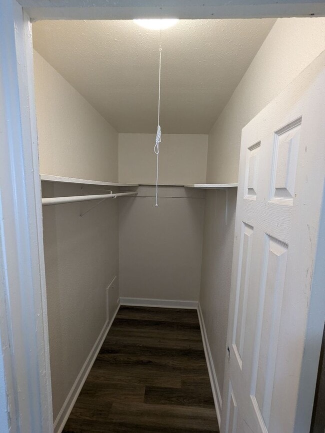 Photo - Ground Level 2 Bedroom, 2 Bath apartment. New flooring and paint. Tenant pays electric and natura...