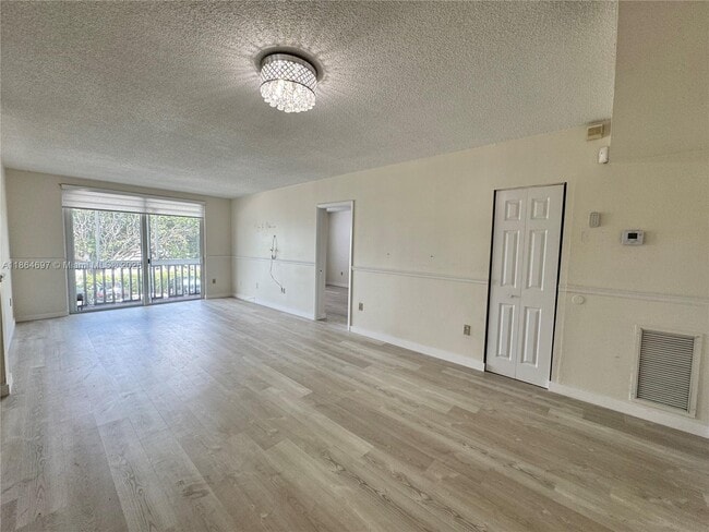 Building Photo - 6701 NW 169th St Unit B207 Rental