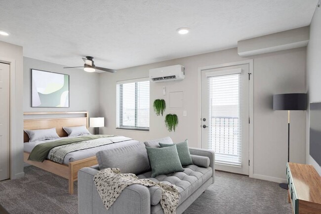 Nuestro estudio Hummingbird se puede organizar fácilmente con espacios separados para vivir y dormir. - The Knock Apartments
