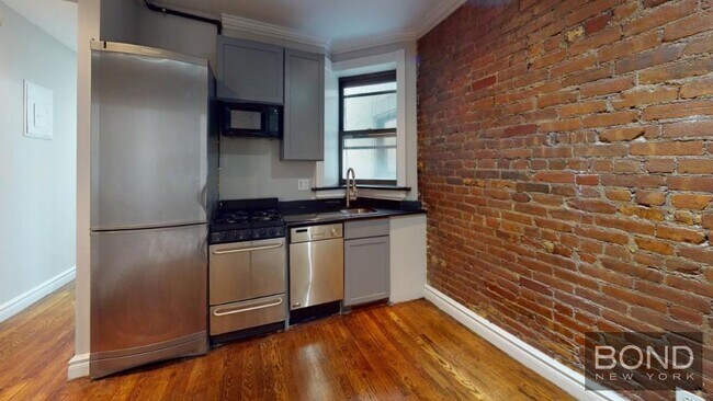 Building Photo - 221 East 23rd-8 Unit 8