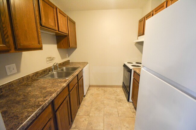 Photo - Main floor condo with great patio & many updates!