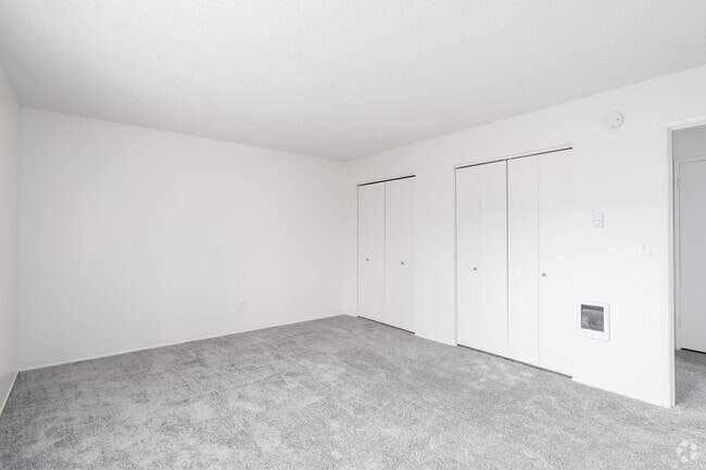 2BR, 1.5BA - 1,100SF - Primary Bedroom