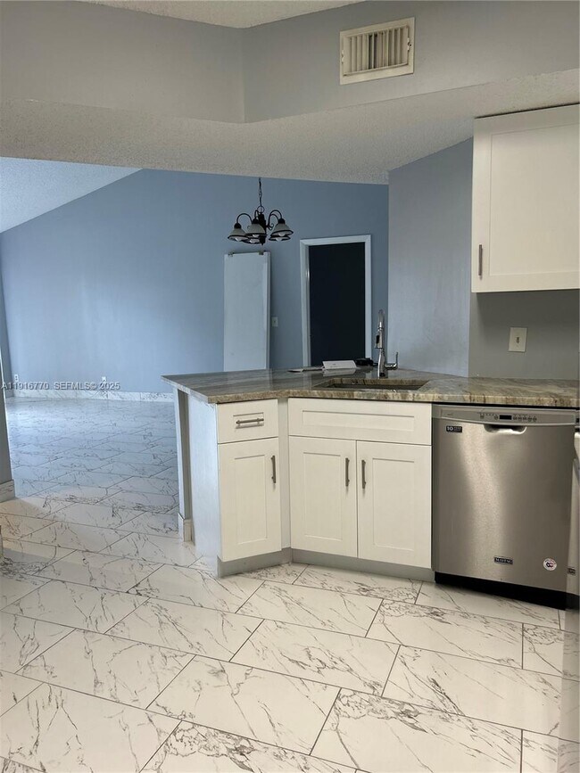 Photo - 8801 Wiles Rd Unit 306