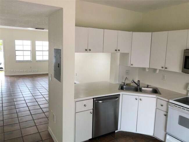 Photo - 9837 W Okeechobee Rd Condo Unit 401