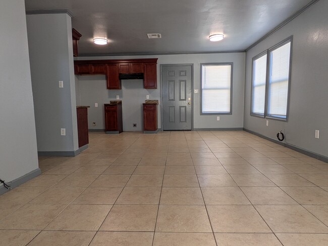 Living room, dining, and kitchen areas flow together, great for entertaining - 807 21st St