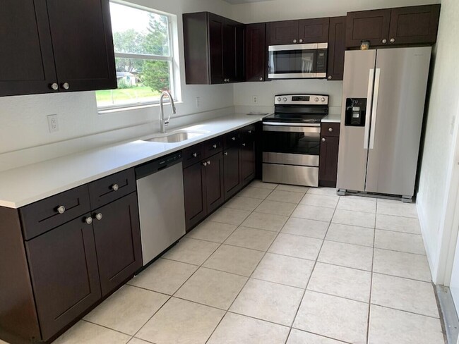 Photo - 1838 SE North Buttonwood Dr