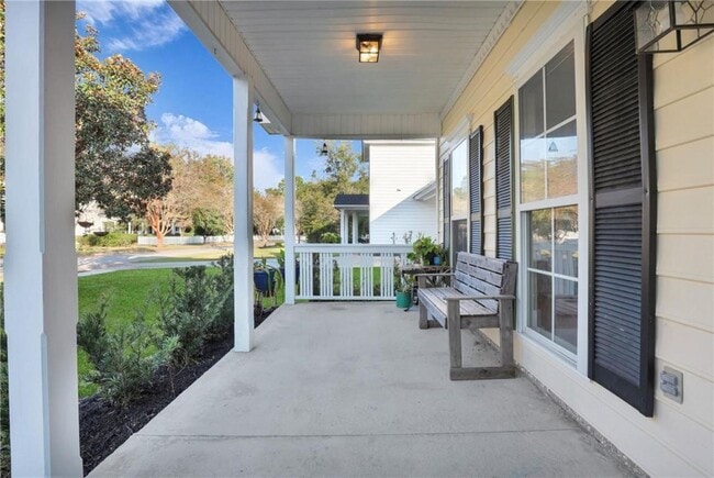Photo - 4-Bedroom Home in Wild Heron with Front Porch and Fenced Yard