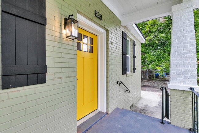 Photo - Cute all brick ranch on a large corner lot with fenced in yard and 1 car garage