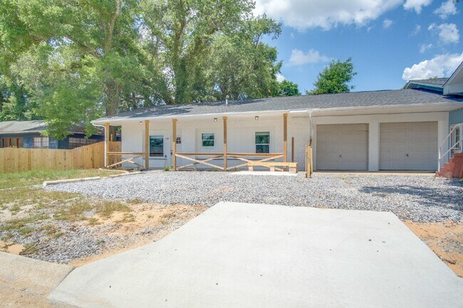 Photo - Fully Remodeled 2BR/2BA Attached Home with Garage, Modern Finishes, Park Views & Prime Downtown P...