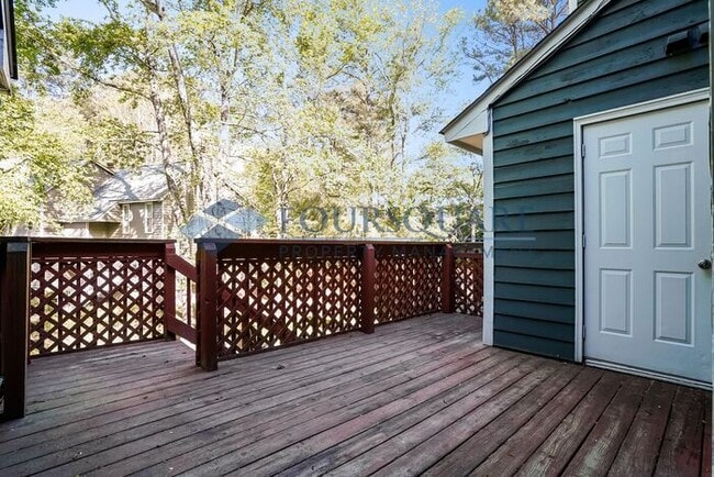 Photo - Bright 2-Bed / 2.5-Bath Townhome with Fireplace, Back Deck & Open Living – Convenient to Cary