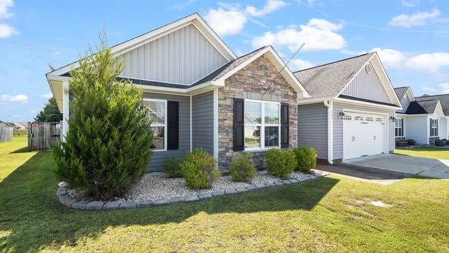 Photo - Charming 3BR Home in Carolina Plantation with Fenced Yard & 2-Car Garage