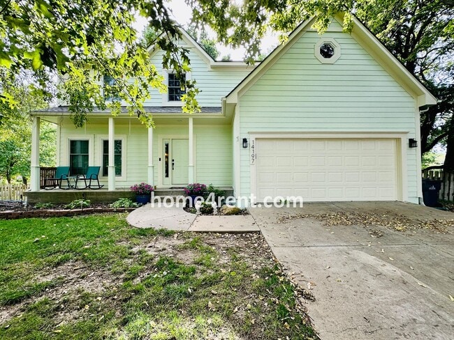 Photo - Blue Valley Schools w/ Wood Floors, Finished Basement and a Peaceful, Private Fenced Yard!