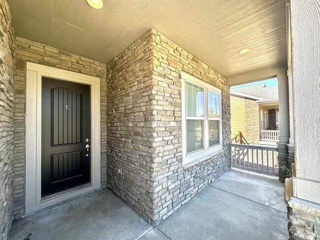 Photo - Modern 4-Bed Ranch in Erie with 13-Ft Ceilings, Solar Panels & EV Charger