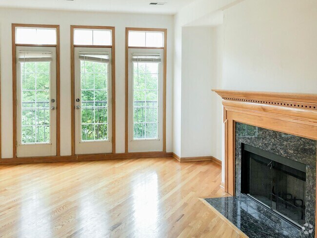 Building Photo - 1321 W Belmont Ave Unit 1 Rental