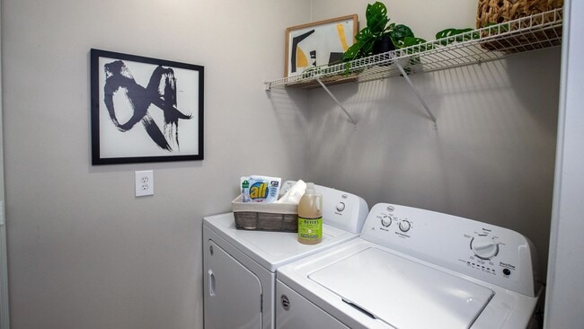 Experience the ultimate convenience of our laundry room, equipped with a full-size side-by-side washer and dryer!