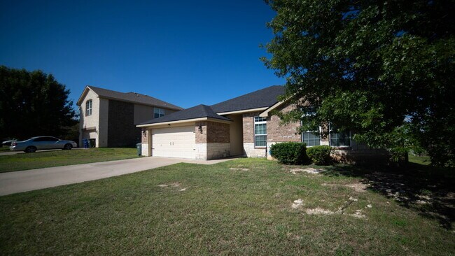 Photo - Beautiful 4-Bedroom Home with Spacious Bac...