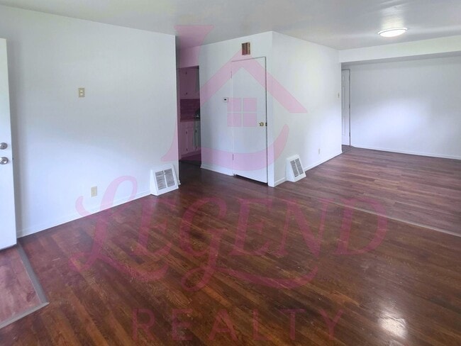 Photo - 3 Bedrooms | 1 Bathroom | Hardwood Floors | Bright Living/Dining Area | Galley Kitchen | Unfinish...